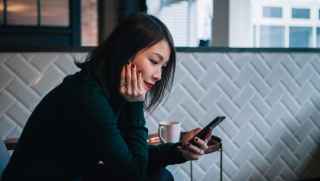  Woman looking at her cellphone