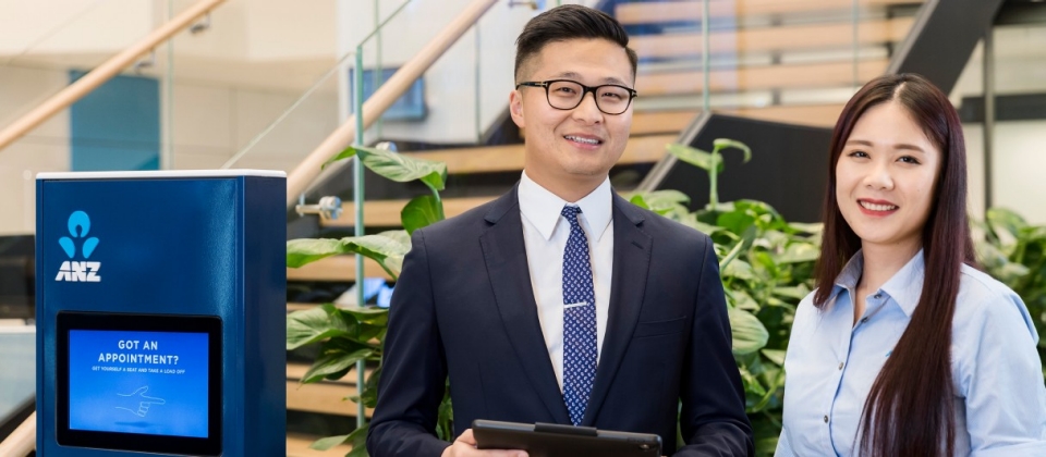 ANZ Branch staff and customer